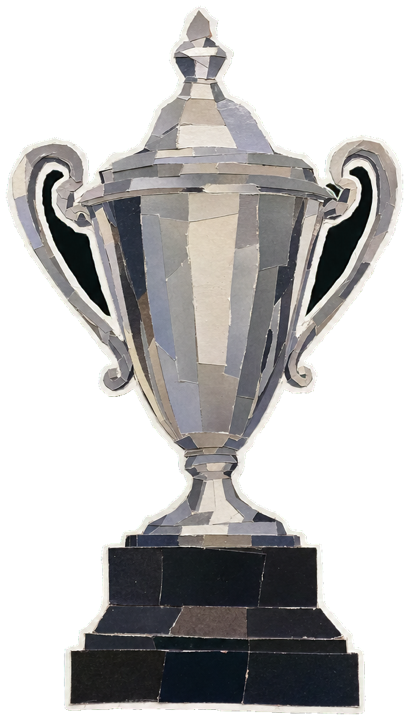 24 Hours of Le Mans overall winner's trophy, tall ornate silver endurance cup standing on a dark plinth