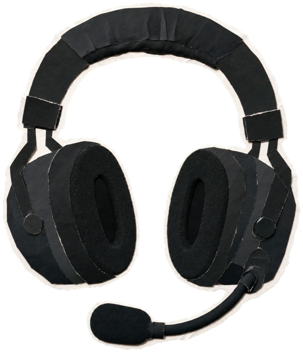 a black F1 team headset with foam earcups and a slim boom microphone, single headset isolated
