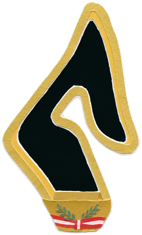 The winner's gold trophy with a green laurel wreath